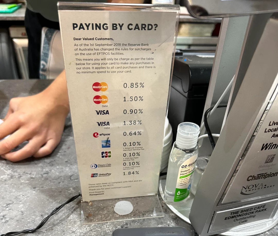 An example of merchant surcharge signage at the point of sale.